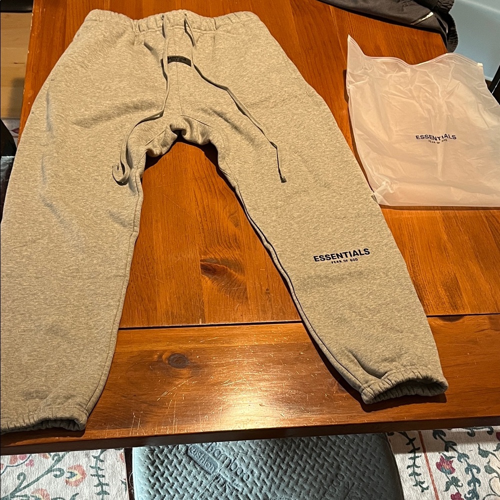 Essentials Dark Oatmeal size S 
Fits like a Size M